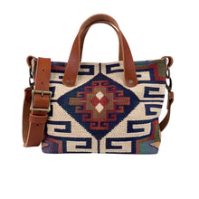Load image into Gallery viewer, Front view of women's southwestern mini tote handbag. Chestnut brown leather handles with a removable, buckle adjustable strap. Antique brass hardware.